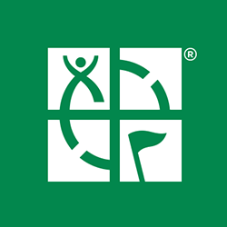 Et grønt logo med et kryds i midten.